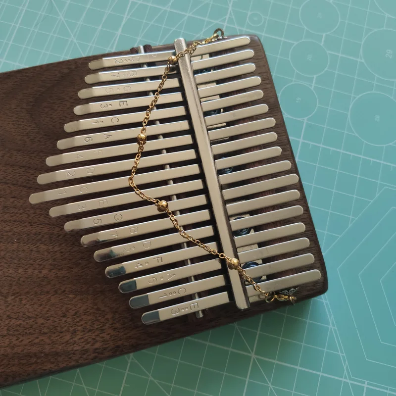 DIY Kalimba Piano Chain Tremolo Silver /Gold Sand Chains for 17 keys kalimbas Musical instrument accessories
DIY Kalimba Piano Chain Tremolo Silver /Gold Sand Chains for 17 keys kalimbas Musical instrument accessories