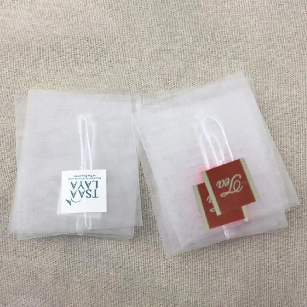 1Pc Non-Woven Paper Empty Draw String Teabags Heat Seal Filter Herb Loose Tea Bag Pouch
1Pc Non-Woven Paper Empty Draw String Teabags Heat Seal Filter Herb Loose Tea Bag Pouch