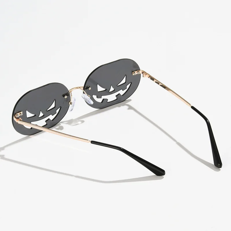 

Rimless Pumpkin Shape Sunglasses Women Men 2020 Oval Alloy Hollow Sun Glasses Female Halloween Pumpkin Punk Eyeglasses Oculos