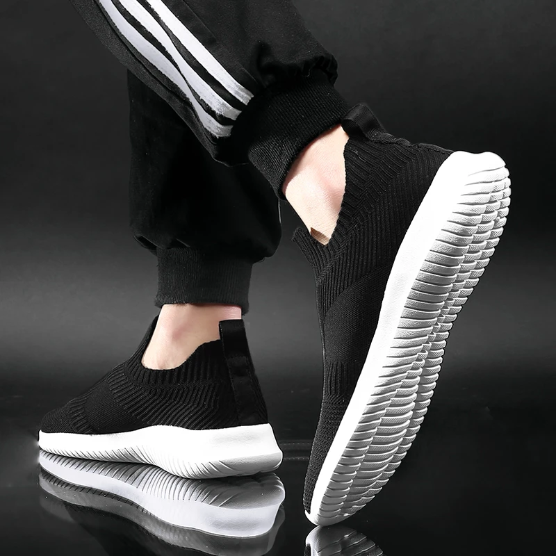 Slip-On Sneakers Men Lightweight Running Shoes Breathable Knitted Sock Shoes White Jogging Walking Sport Shoes Male Casual Shoes
Slip-On Sneakers Men Lightweight Running Shoes Breathable Knitted Sock Shoes White Jogging Walking Sport Shoes Male Casual Shoes