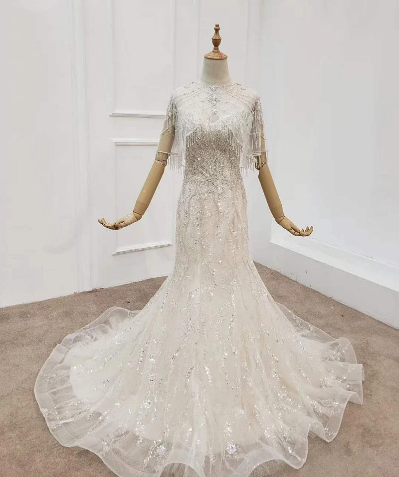 Настоящая фотография, Роскошные свадебные платья русалки 2020 без бретелек, с длинными рукавами и длинным шлейфом, с аппликацией из бисера, св... 
Настоящая фотография, Роскошные свадебные платья русалки 2020 без бретелек, с длинными рукавами и длинным шлейфом, с аппликацией из бисера, св...