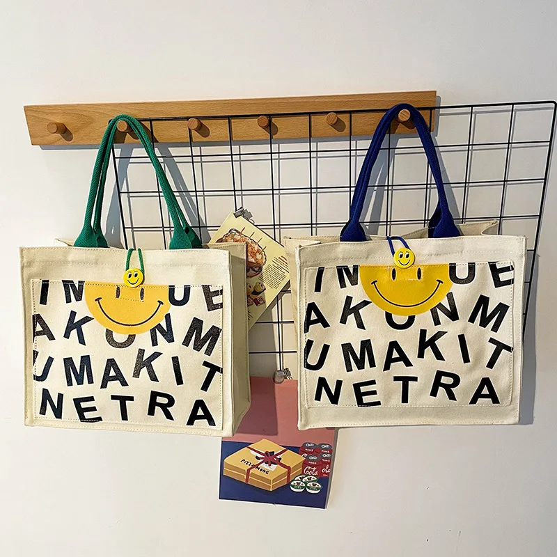 Tote Bag New INS Cartoon Smiley Face Bag Tide Simple Canvas Bag Letter Printing Large-capacity Handbag One-shoulder Bag
Tote Bag New INS Cartoon Smiley Face Bag Tide Simple Canvas Bag Letter Printing Large-capacity Handbag One-shoulder Bag