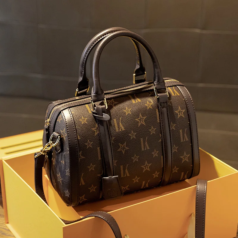 Handbag lady bag female 2020 new fashion Korean large capacity version of the slung tote Wild Large Capacity Boston Bag
Handbag lady bag female 2020 new fashion Korean large capacity version of the slung tote Wild Large Capacity Boston Bag