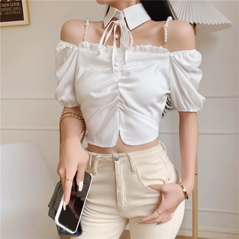 2021 Summer Women Off Shoulder Puff Short Sleeves Turn Down Collar Beading Shirts Female Pullover Tops Ladies Shirt Blouse 
2021 Summer Women Off Shoulder Puff Short Sleeves Turn Down Collar Beading Shirts Female Pullover Tops Ladies Shirt Blouse