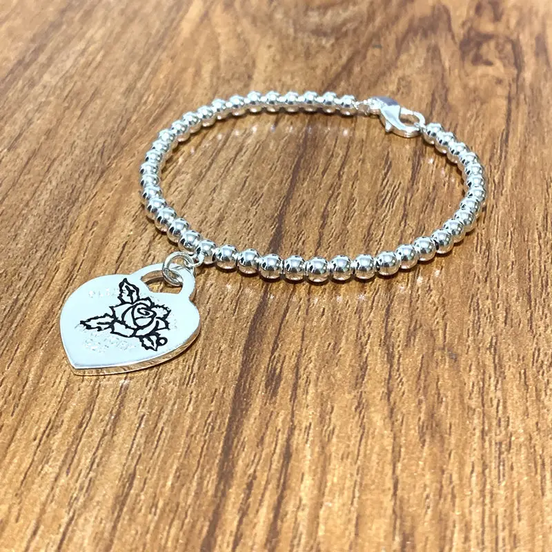 1:1 original woman 925 sterling silver rose, lightning, Cupid love pendant bracelet, classic fashion jewelry couple holiday gift
1:1 original woman 925 sterling silver rose, lightning, Cupid love pendant bracelet, classic fashion jewelry couple holiday gift
