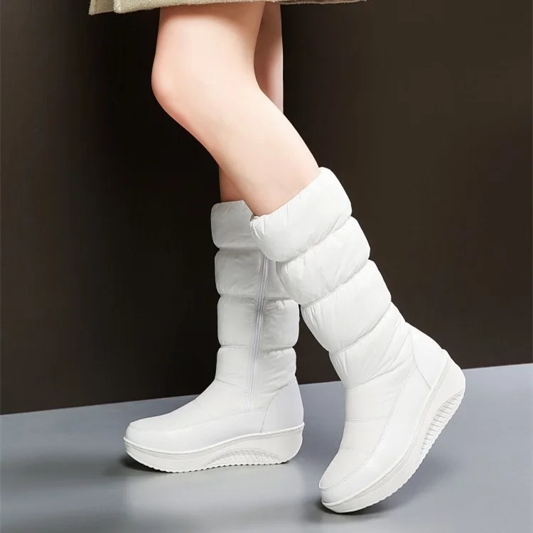 Women's boots autumn and winter new cotton boots waterproof platform down cloth slope heel snow boots
Women's boots autumn and winter new cotton boots waterproof platform down cloth slope heel snow boots