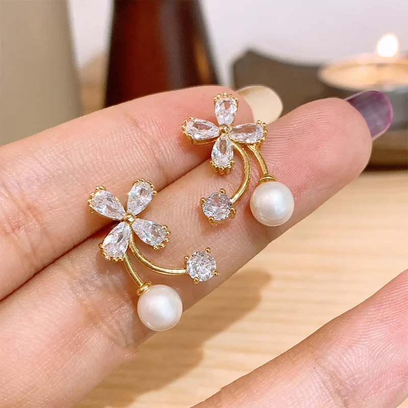 New Korean Fashion Sweet Pearl Flower Earrings for Ladies and Girls Cute and Elegant Party Jewelry Gifts
New Korean Fashion Sweet Pearl Flower Earrings for Ladies and Girls Cute and Elegant Party Jewelry Gifts