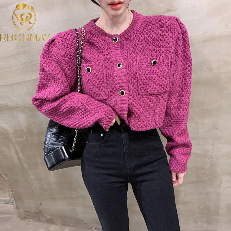 Double Pocket Puff Sleeve Knitted Sweater Korean Autumn Retro Temperament Sweater Round Neck Chic Button Loose Pullover
Double Pocket Puff Sleeve Knitted Sweater Korean Autumn Retro Temperament Sweater Round Neck Chic Button Loose Pullover