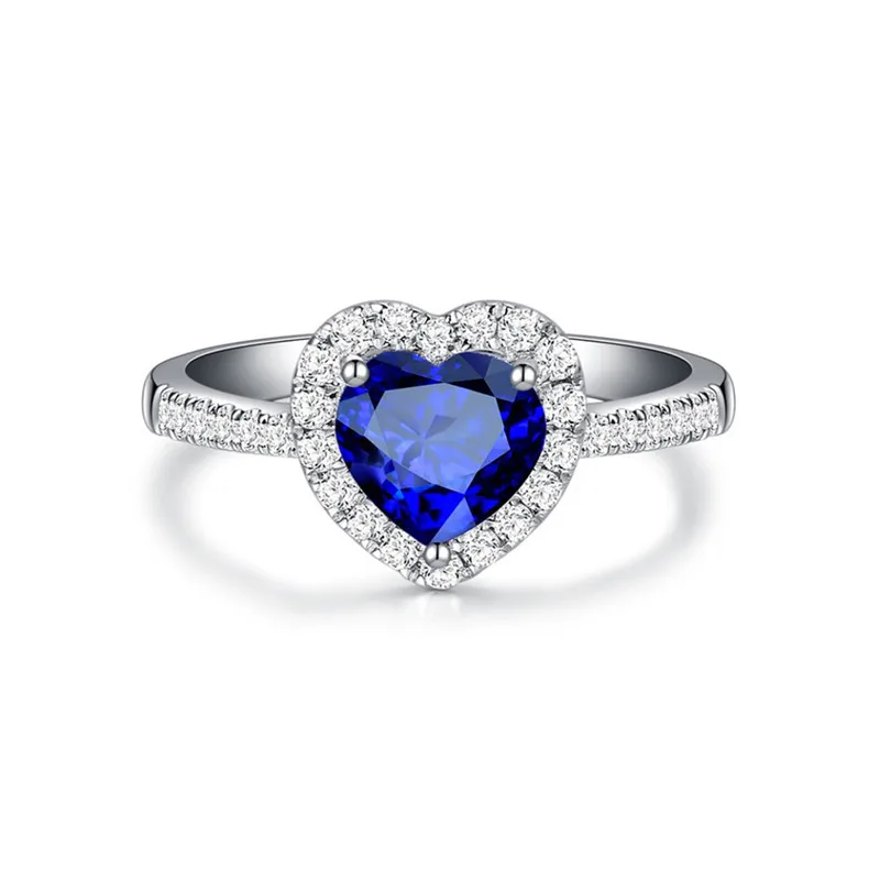 

Женское кольцо из серебра 925 пробы с фианитом и голубым сердцем