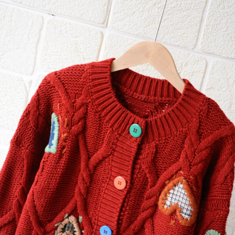 Autumn and winter new Korean embroidered love twist sweet sweater short fashion thick knitted sweater cardigan women trend
Autumn and winter new Korean embroidered love twist sweet sweater short fashion thick knitted sweater cardigan women trend