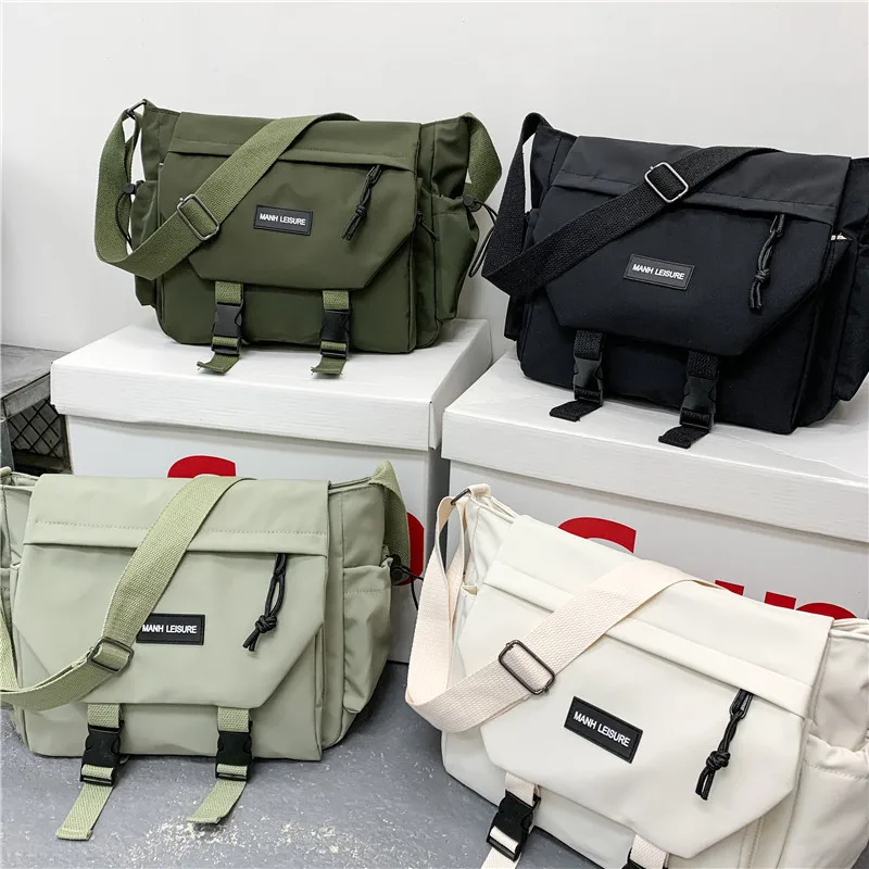 2021 New Fashion Men Women Street Style Shoulder Bag Student School Bags Cool Messenger Bag Nylon Female Crossbody Bag Handbag
2021 New Fashion Men Women Street Style Shoulder Bag Student School Bags Cool Messenger Bag Nylon Female Crossbody Bag Handbag
