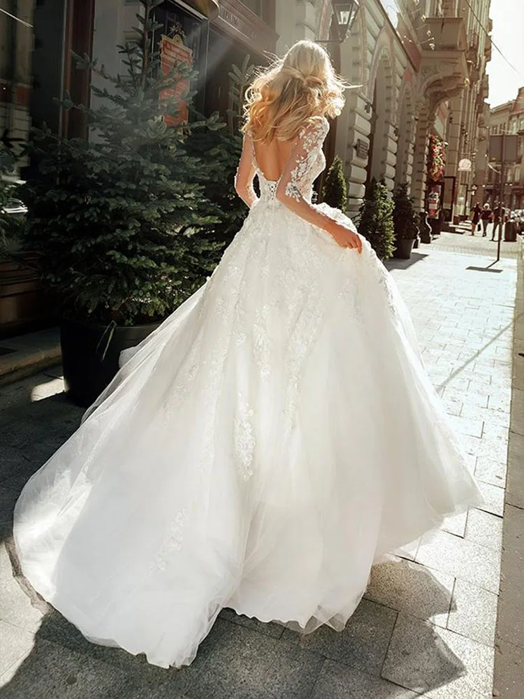 YILIBER Lace wedding dress o-neck long sleeve retro atmosphere wedding gown pearl feather flower fluffy skirt
YILIBER Lace wedding dress o-neck long sleeve retro atmosphere wedding gown pearl feather flower fluffy skirt