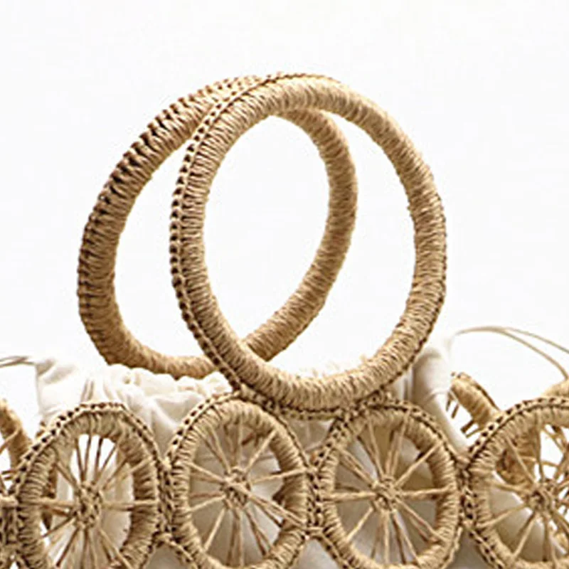 Vintage Hollow Bags Wooden Handle Rattan Woven Beach Handbags Wheel Design Totes Lady Purses
Vintage Hollow Bags Wooden Handle Rattan Woven Beach Handbags Wheel Design Totes Lady Purses