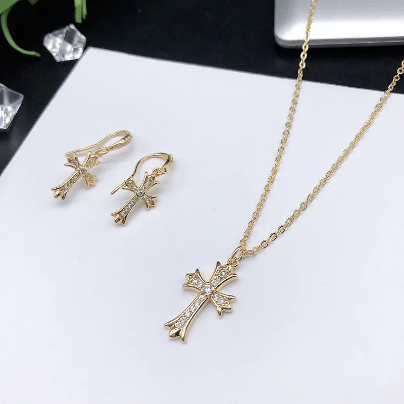 Korean Fashion Women's Gold Micro Set Diamond Cross Ear Hook Necklace Set High Quality Shining Star Zircon Pendant Necklace
Korean Fashion Women's Gold Micro Set Diamond Cross Ear Hook Necklace Set High Quality Shining Star Zircon Pendant Necklace