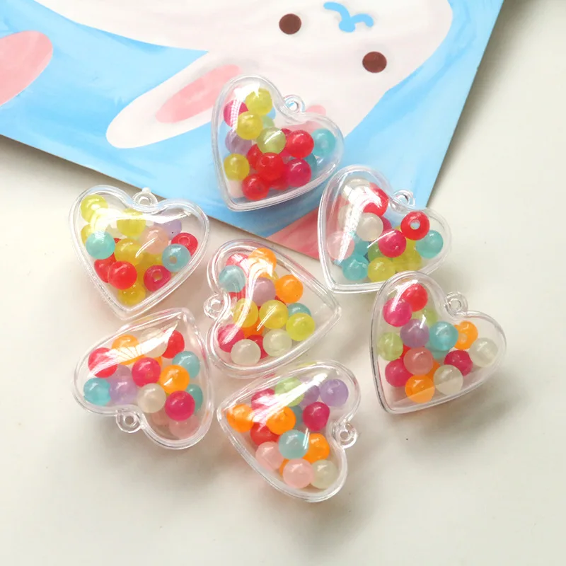 Newest 50pcs/lot color balls core cartoon transparent hearts shape acrylic beads diy jewelry earring/garment pendant accessory
Newest 50pcs/lot color balls core cartoon transparent hearts shape acrylic beads diy jewelry earring/garment pendant accessory