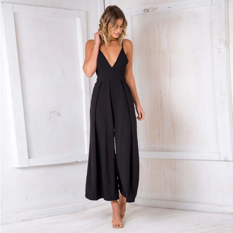 Fashion suspender sexy V-neck open back bow tie loose Jumpsuit 
Fashion suspender sexy V-neck open back bow tie loose Jumpsuit