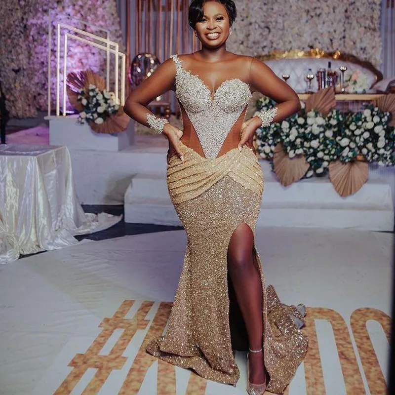 Sexy Sequined Prom Dresses With Illusion Long Sleeves Pleats Side Split Mermaid Evening Dress Sexy Back Appliques Aso Ebi Gowns
Sexy Sequined Prom Dresses With Illusion Long Sleeves Pleats Side Split Mermaid Evening Dress Sexy Back Appliques Aso Ebi Gowns