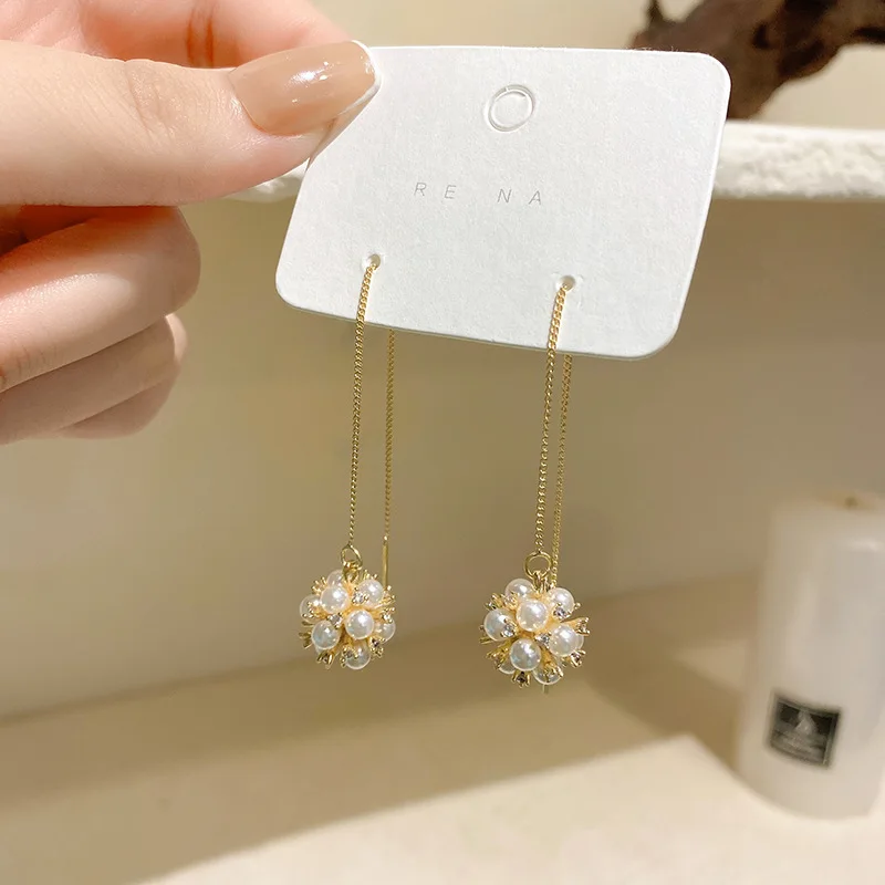 Korean Temperament Fashion Pearl Ball Tassel Ear Line Female Net Celebrity Personality Earrings Women's Design Earrings ES001-52
Korean Temperament Fashion Pearl Ball Tassel Ear Line Female Net Celebrity Personality Earrings Women's Design Earrings ES001-52