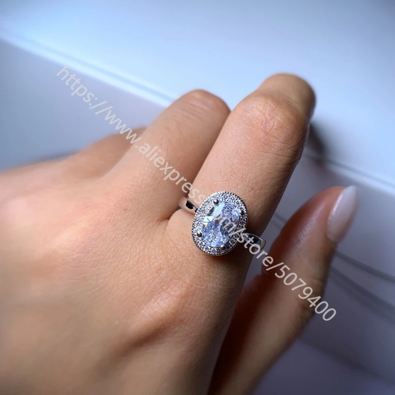 Oval Halo Brilliant AAA Cubic Zirconia Ring white gold plated Engagement Ring silvers Promise Ring AnniversaryTravel Ring
Oval Halo Brilliant AAA Cubic Zirconia Ring white gold plated Engagement Ring silvers Promise Ring AnniversaryTravel Ring