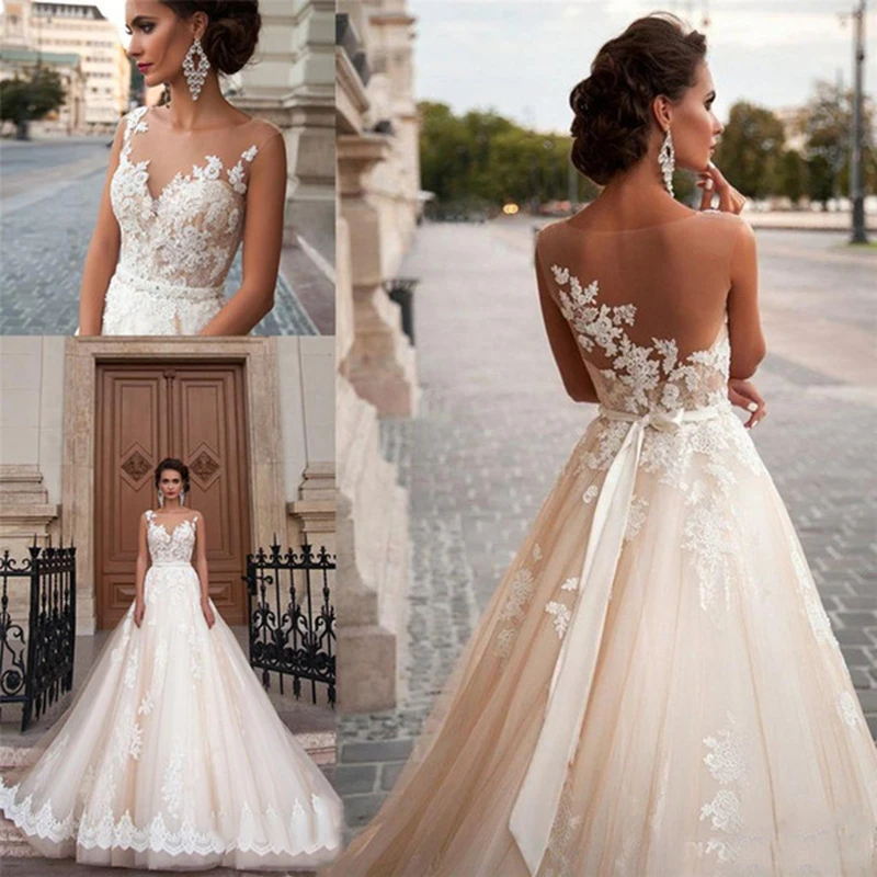 Vestido noiva Lace Appliques Long Wedding Dresses Short Sleeve Tulle Bridal Wedding Gowns Open Back A Line Bride Wedding Dress
Vestido noiva Lace Appliques Long Wedding Dresses Short Sleeve Tulle Bridal Wedding Gowns Open Back A Line Bride Wedding Dress