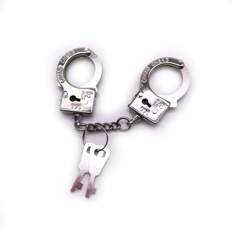 

FREE SHIPPING BY DHL 100pcs/lot New Fashion Metal Mini Handcuff Shaped Keychains Small Handcuff Keyrings Blister Card Packaging