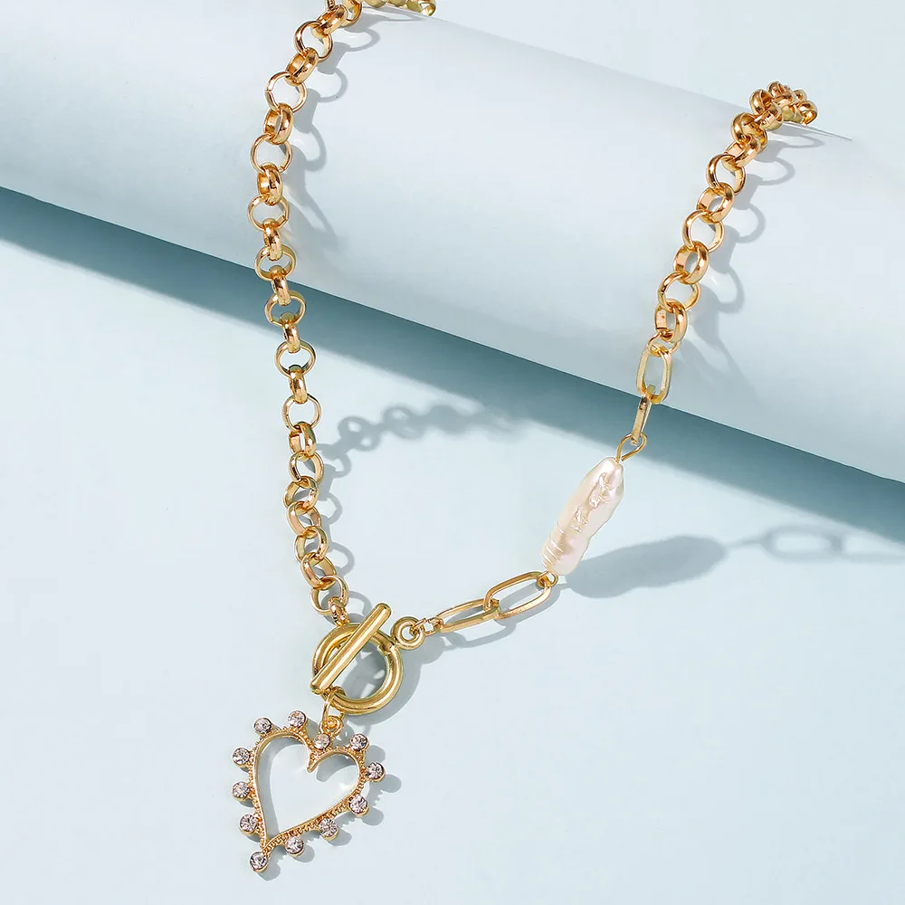 Punk Rock Geometric Love Heart Pearl Necklace Exquisite Crystal Zircon Pendant Gold Color Clavicle Chain Women's Party Jewelry
Punk Rock Geometric Love Heart Pearl Necklace Exquisite Crystal Zircon Pendant Gold Color Clavicle Chain Women's Party Jewelry