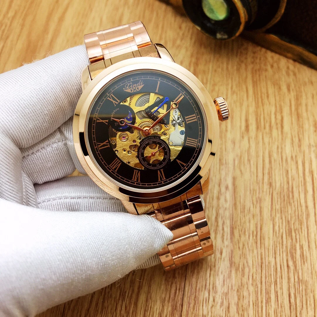 Hot sale in gold style, simple round hollow men's mechanical watch with solid steel band 2021 new casual fashion business
Hot sale in gold style, simple round hollow men's mechanical watch with solid steel band 2021 new casual fashion business
