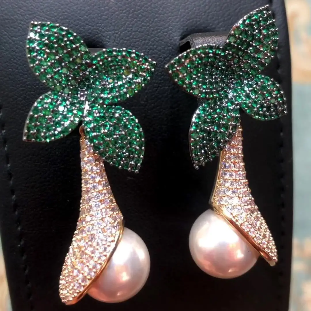 SORAMOORE Luxury Flower Leaf Trendy High Quality Pearl Earrings Naija Wedding Party Earring Fashion Jewelry for Women Girl 2021
SORAMOORE Luxury Flower Leaf Trendy High Quality Pearl Earrings Naija Wedding Party Earring Fashion Jewelry for Women Girl 2021