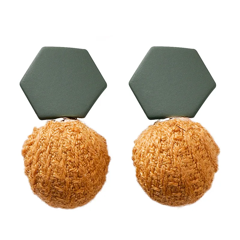 New fashion Korean version of small hairball cloth art sweet girl geometric versatile cute small dangle earrings
New fashion Korean version of small hairball cloth art sweet girl geometric versatile cute small dangle earrings