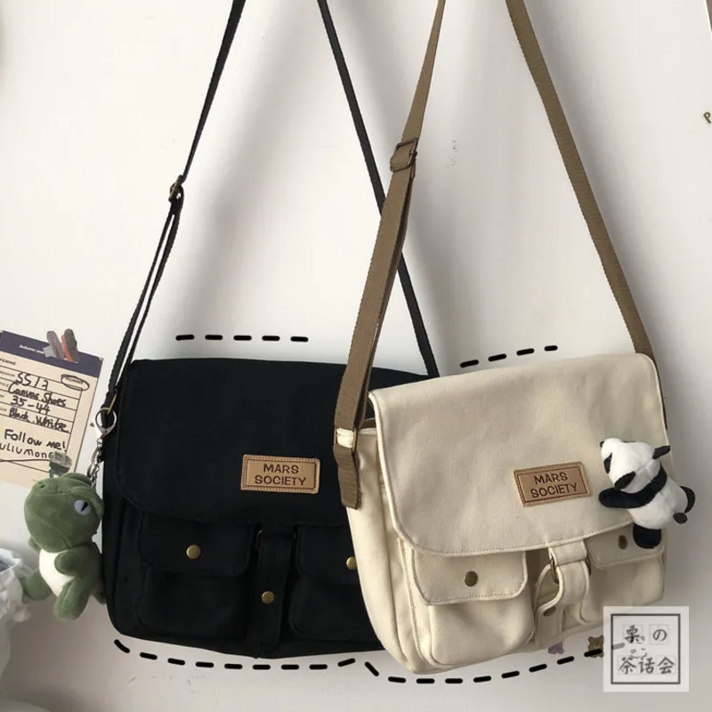 Women's Canvas Bag Japanese Department Harajuku Windsuit Messenger Bag Female Korean Students Shoulder Bags
Women's Canvas Bag Japanese Department Harajuku Windsuit Messenger Bag Female Korean Students Shoulder Bags