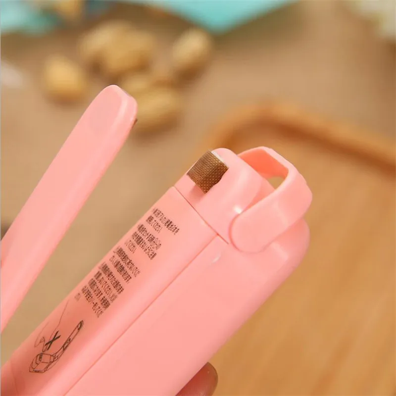 Mini Heat Sealer Plastic Package Storage Bag Mini Sealing Machine Handy Sticker And Seals For Food Snack Kitchen Accessories
Mini Heat Sealer Plastic Package Storage Bag Mini Sealing Machine Handy Sticker And Seals For Food Snack Kitchen Accessories