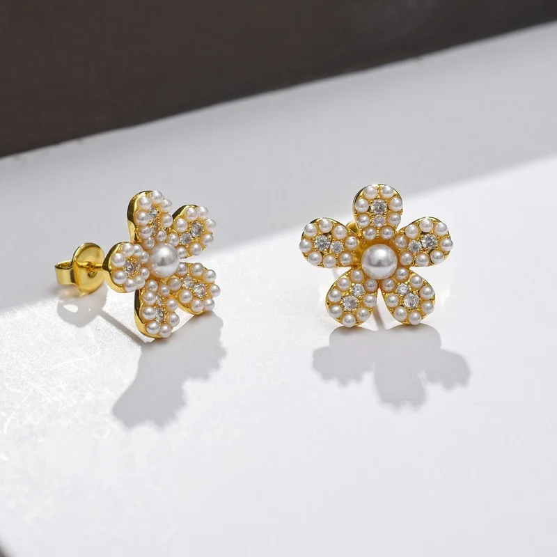 Новые жемчужные серьги в форме золотого цветка, серьги в форме сливы
Новые жемчужные серьги в форме золотого цветка, серьги в форме сливы