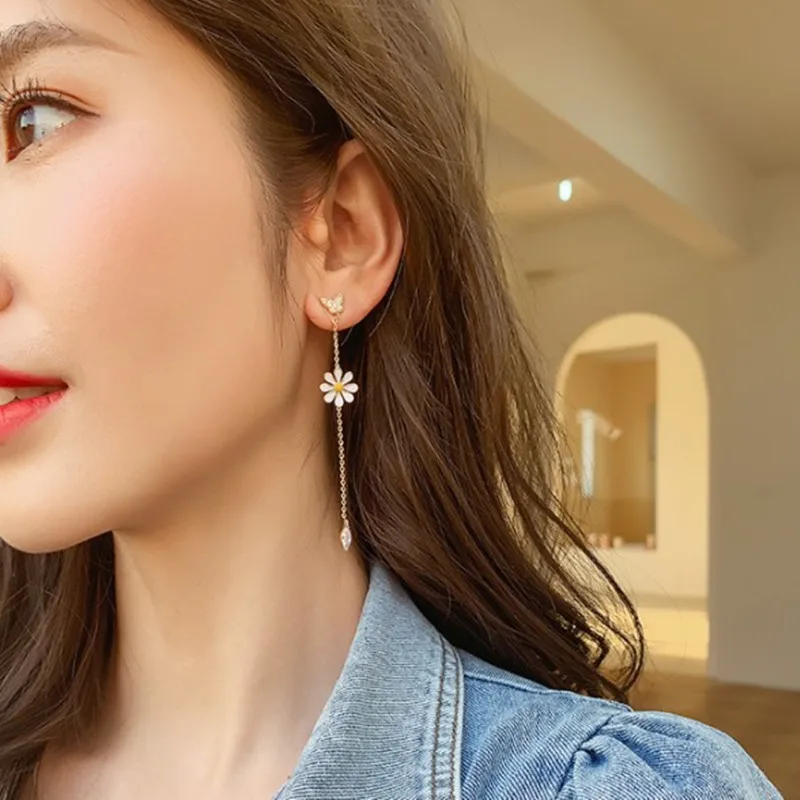 Shamir Long Daisy Flower Earrings 2020 New Wave Shape Asymmetry Of The Daisy Women Stud earrings Jewelry Gifts
Shamir Long Daisy Flower Earrings 2020 New Wave Shape Asymmetry Of The Daisy Women Stud earrings Jewelry Gifts