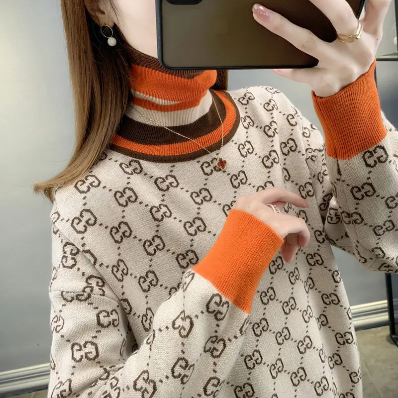 Autumn and winter new high collar color contrast jacquard fashion with knitwear 
Autumn and winter new high collar color contrast jacquard fashion with knitwear