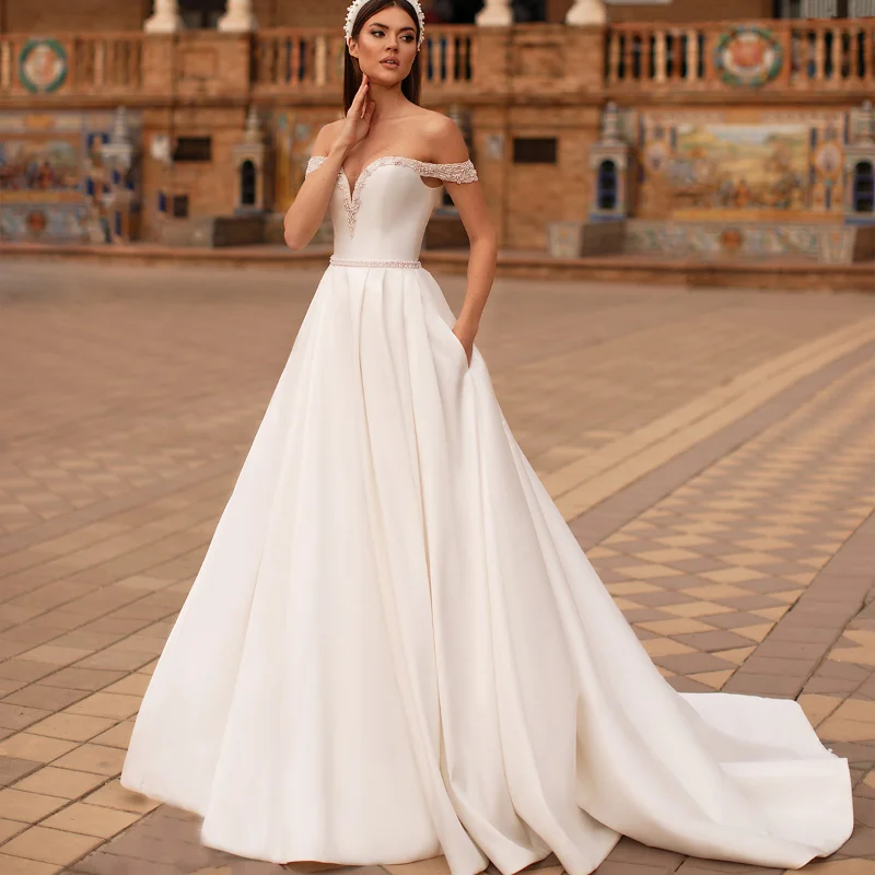 Off the Shoulder Sweetheart Wedding Dresses 2021 A-Line Sleeveless Lace-Up Satin Long Bridal Gowns Backless Vestidos De Novia
Off the Shoulder Sweetheart Wedding Dresses 2021 A-Line Sleeveless Lace-Up Satin Long Bridal Gowns Backless Vestidos De Novia