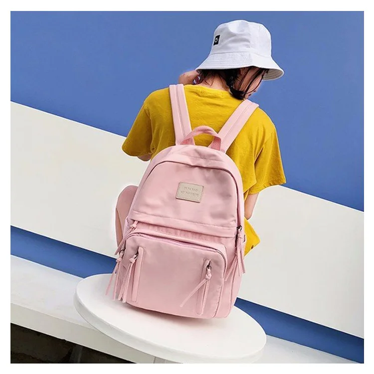 Simple waterproof large-capacity backpack college style literary girl all-match solid color student schoolbag
Simple waterproof large-capacity backpack college style literary girl all-match solid color student schoolbag