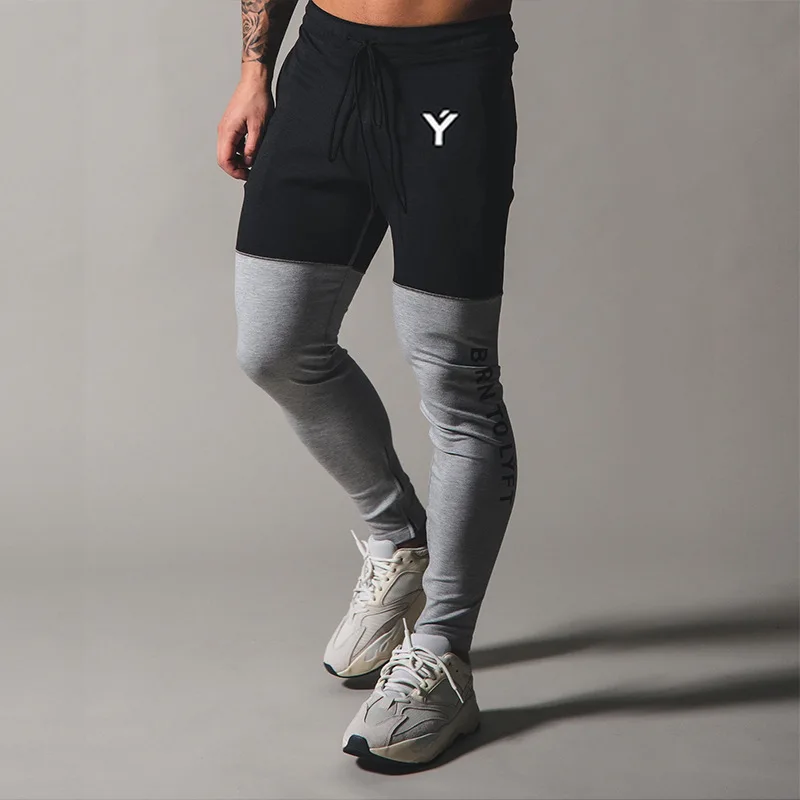 2021 Mens Sport Pants Gym Fitness Sweatpants Workout Training Cotton Trackpants Running Sportswear Men Pants Skinny Trousers
2021 Mens Sport Pants Gym Fitness Sweatpants Workout Training Cotton Trackpants Running Sportswear Men Pants Skinny Trousers