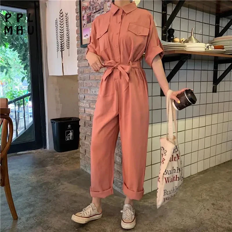 Streetwear short sleeve solid color long jumpsuit women Korean safari style straight bodysuit Casual loose high waist overalls
Streetwear short sleeve solid color long jumpsuit women Korean safari style straight bodysuit Casual loose high waist overalls