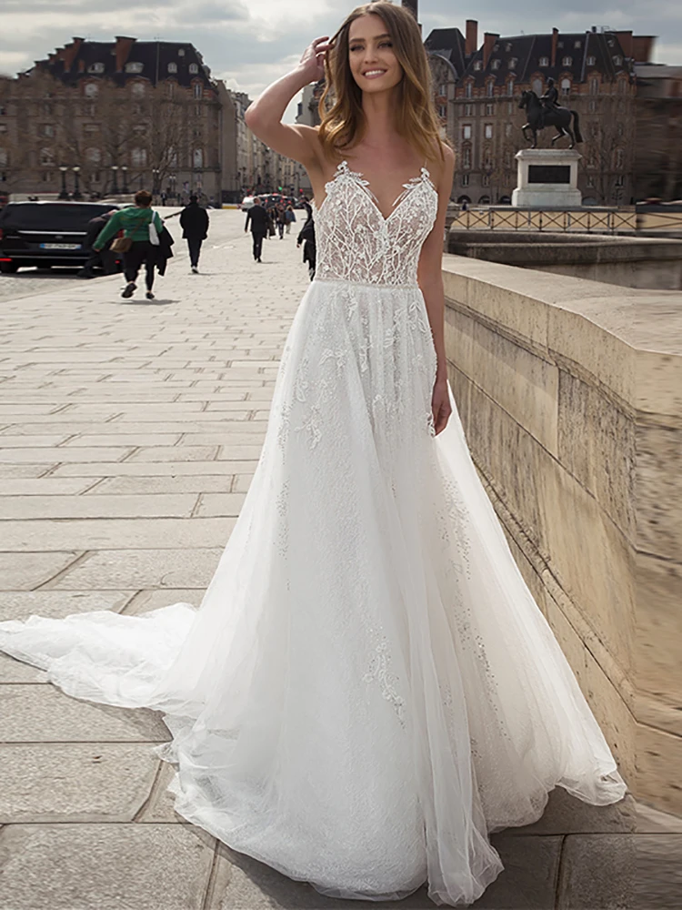Bohemian Long A-Line Backless Wedding Dress 3d Flower Spaghetti Strap Bridal Dress Princess Long Tail Wedding Dress Custom
Bohemian Long A-Line Backless Wedding Dress 3d Flower Spaghetti Strap Bridal Dress Princess Long Tail Wedding Dress Custom