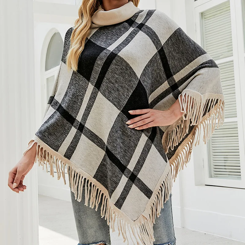 2021 new sweater women European and American high neck tassel cloak shawl plaid loose coat
2021 new sweater women European and American high neck tassel cloak shawl plaid loose coat