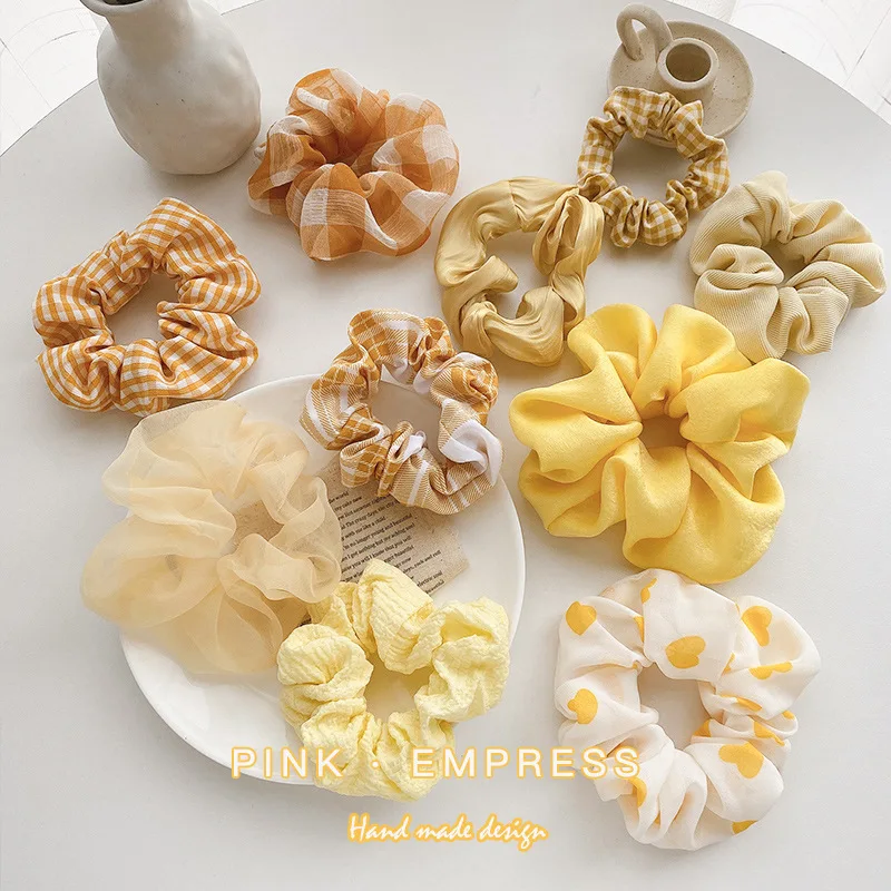 Girl cute intestine headband yellow pork intestine Hairband female French simplicity large intestine ring headdress
Girl cute intestine headband yellow pork intestine Hairband female French simplicity large intestine ring headdress