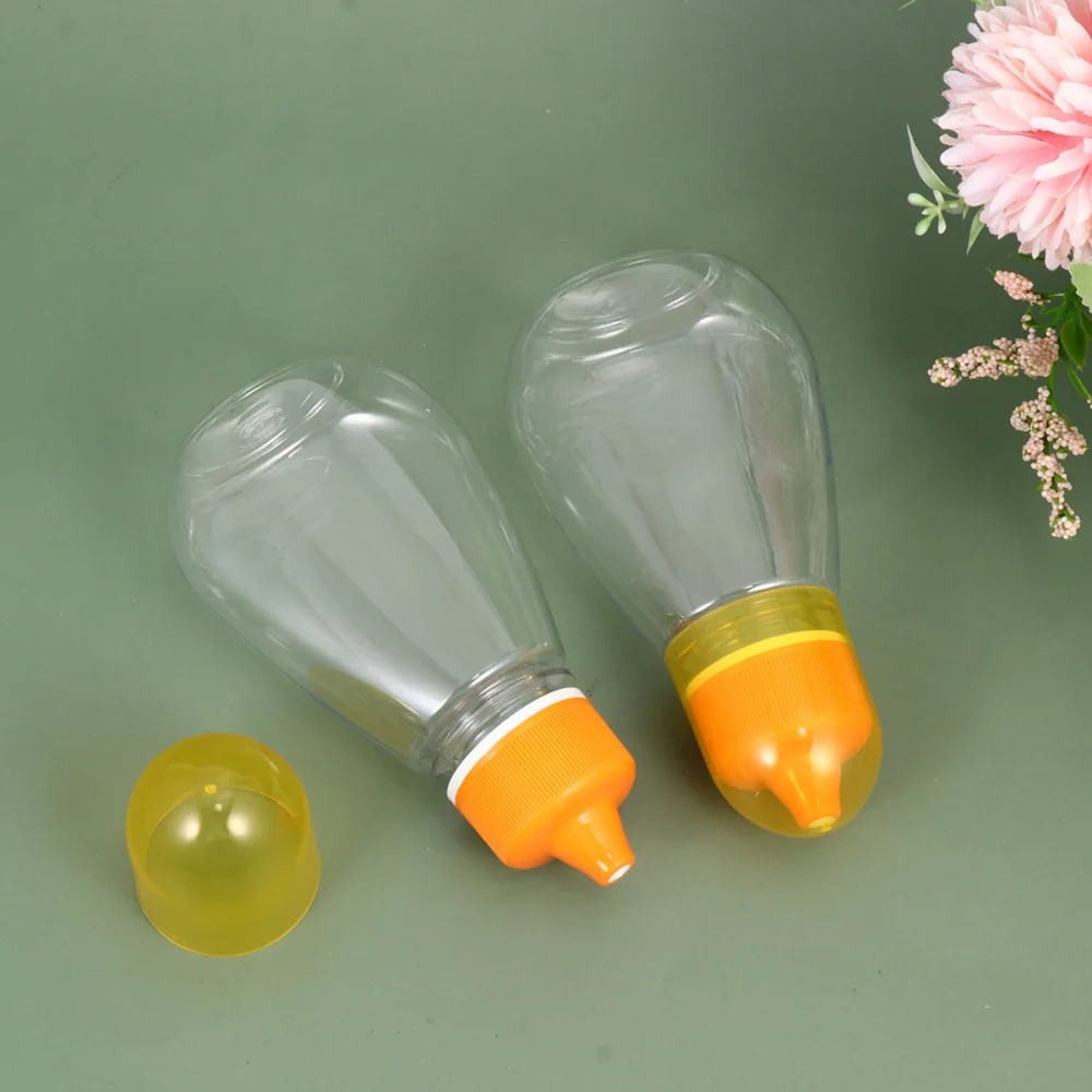 4PCS Transparent Honey Bottle Liquid Food Storage Bottle Sharp Spout Food Packaging Bottle Portable Honey Jar With Lid
4PCS Transparent Honey Bottle Liquid Food Storage Bottle Sharp Spout Food Packaging Bottle Portable Honey Jar With Lid