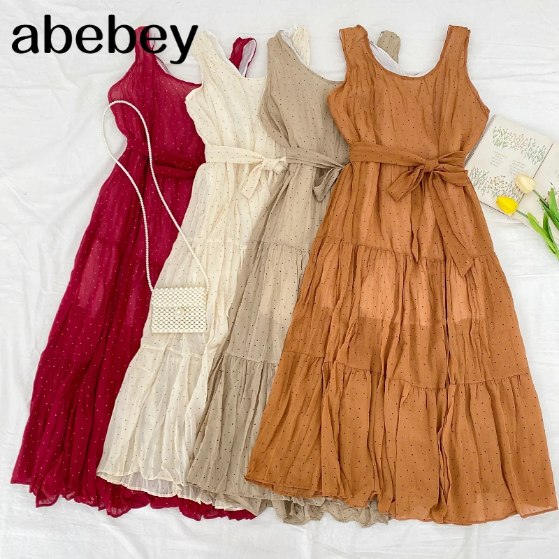 Женское шифоновое платье в горошек, милое универсальное плиссированное платье с круглым вырезом, без рукавов, с поясом на талии, лето 2021 
Женское шифоновое платье в горошек, милое универсальное плиссированное платье с круглым вырезом, без рукавов, с поясом на талии, лето 2021