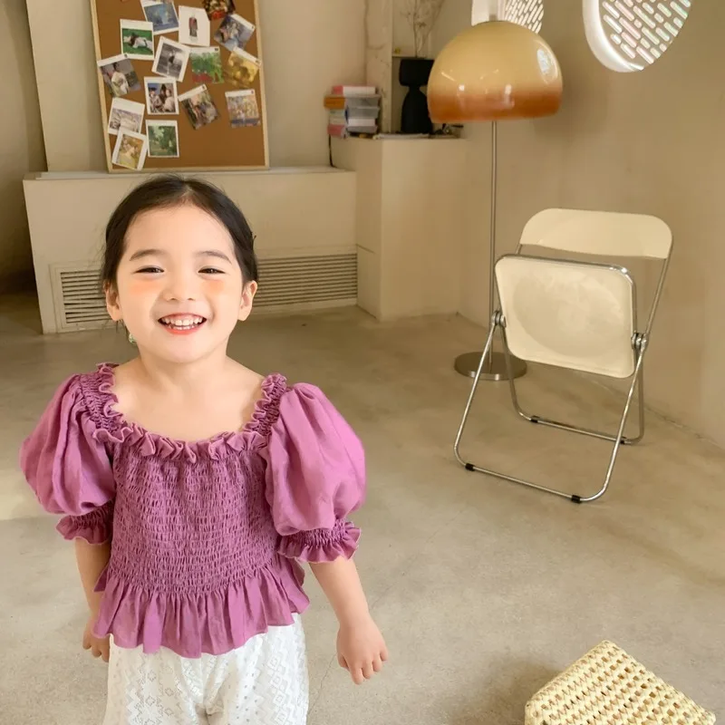2021 New Girls Solid Color Pearl Fabric Encrypted Pleated Bubble Sleeve Princess Shirts Children Kids Short Sleeve Top Clothes
2021 New Girls Solid Color Pearl Fabric Encrypted Pleated Bubble Sleeve Princess Shirts Children Kids Short Sleeve Top Clothes