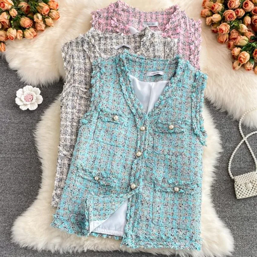 New arrival autumn V-neck loose tassel woven tweed vest women temperament ladies small fragrance outwear
New arrival autumn V-neck loose tassel woven tweed vest women temperament ladies small fragrance outwear