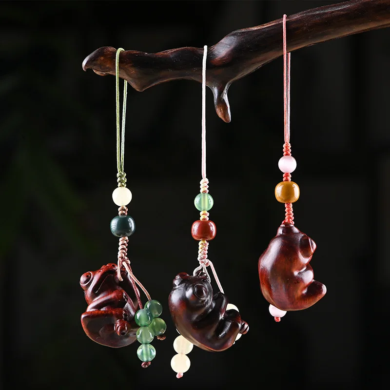 Creative lobular rosewood carving frog mobile phone chain Fu frog pendant mobile phone pendant custom mobile phone shell jewelry
Creative lobular rosewood carving frog mobile phone chain Fu frog pendant mobile phone pendant custom mobile phone shell jewelry