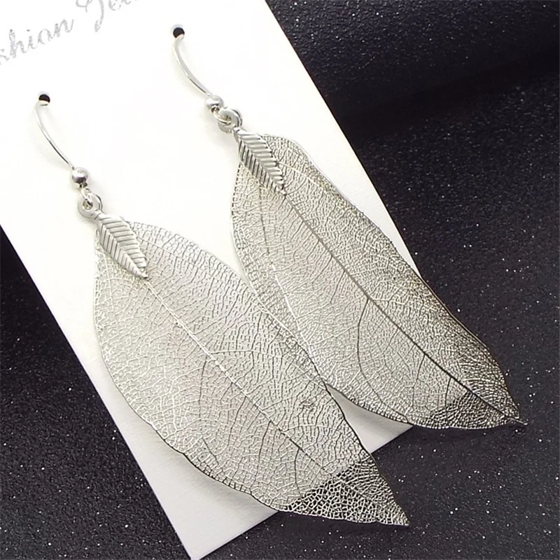 Elegant Leaves Dangle Earrings Long Gold Hollow Leaf Charm Earrings for Women Gift Handmade Fashion Jewelry Best Gift Wholesale
Elegant Leaves Dangle Earrings Long Gold Hollow Leaf Charm Earrings for Women Gift Handmade Fashion Jewelry Best Gift Wholesale