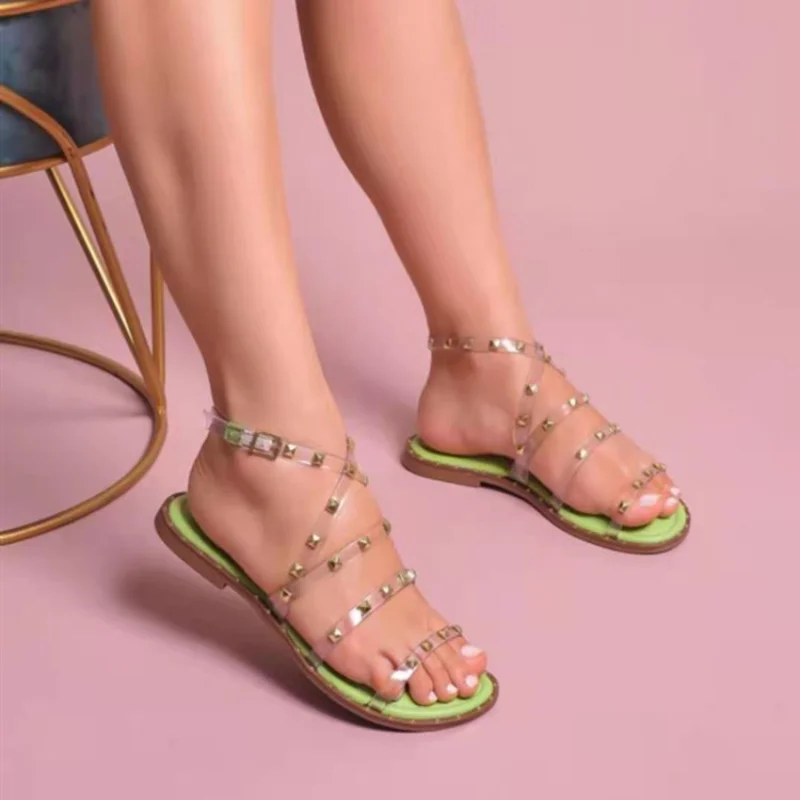 Women Rivet Flats Sandals Ladies Summer Shoes Ankle Buckle Strap Sandals Transparent Sandalias Female Fashion Comfort Zapatos
Women Rivet Flats Sandals Ladies Summer Shoes Ankle Buckle Strap Sandals Transparent Sandalias Female Fashion Comfort Zapatos