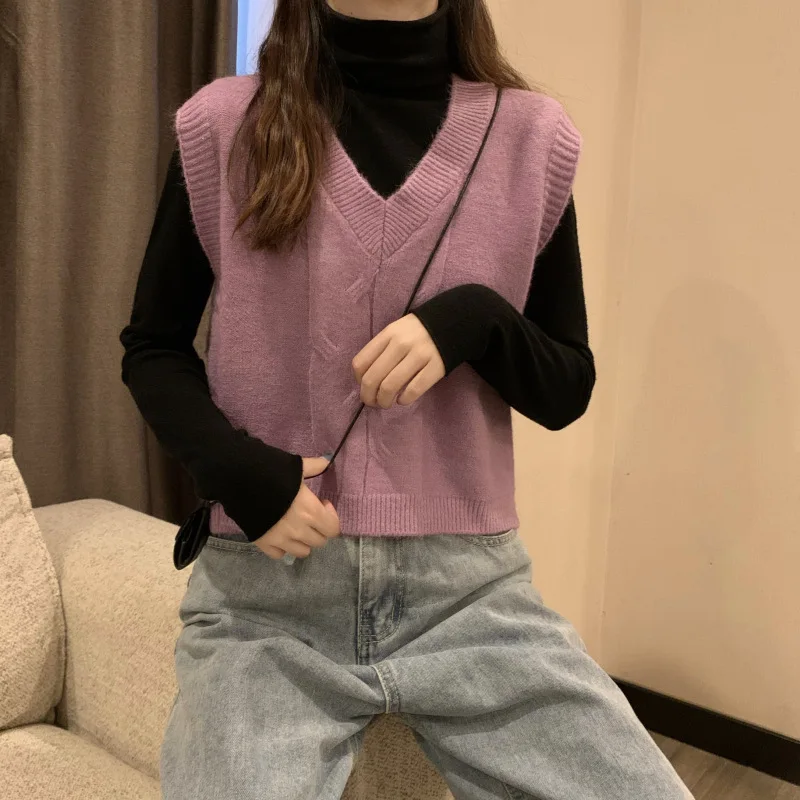 Autumn Veste Sans Manche Ladies Casual Loose V-neck Sleeveless Tops Winter Women Fashion Slim Knitted Vest Spencer Trui Mouwloos
Autumn Veste Sans Manche Ladies Casual Loose V-neck Sleeveless Tops Winter Women Fashion Slim Knitted Vest Spencer Trui Mouwloos