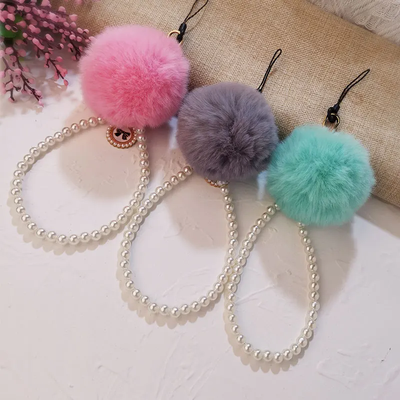 Mobile phone lanyard hair ball pendant winter plush pearl pendant fashion jewelry small bell pendant bag hanging chain
Mobile phone lanyard hair ball pendant winter plush pearl pendant fashion jewelry small bell pendant bag hanging chain